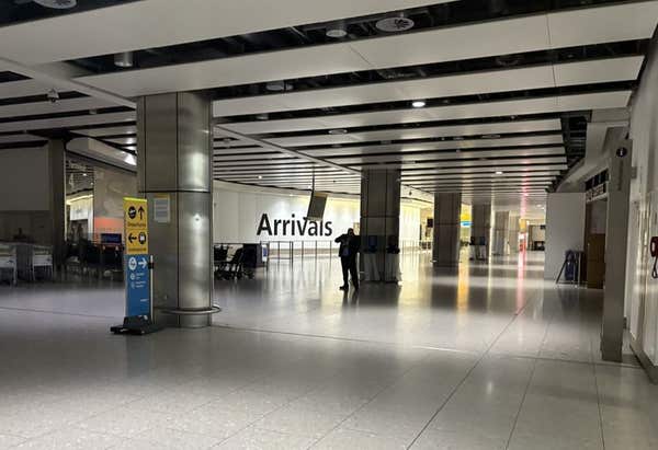 An empty airport arrivals hall