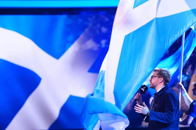 Ian Stirling and the Scotland flag during the 2025 BBC Sports Personality of the Year Awards held at dock10 Studios at MediaCityUK, Salford. Picture date: Thursday December 18, 2025.