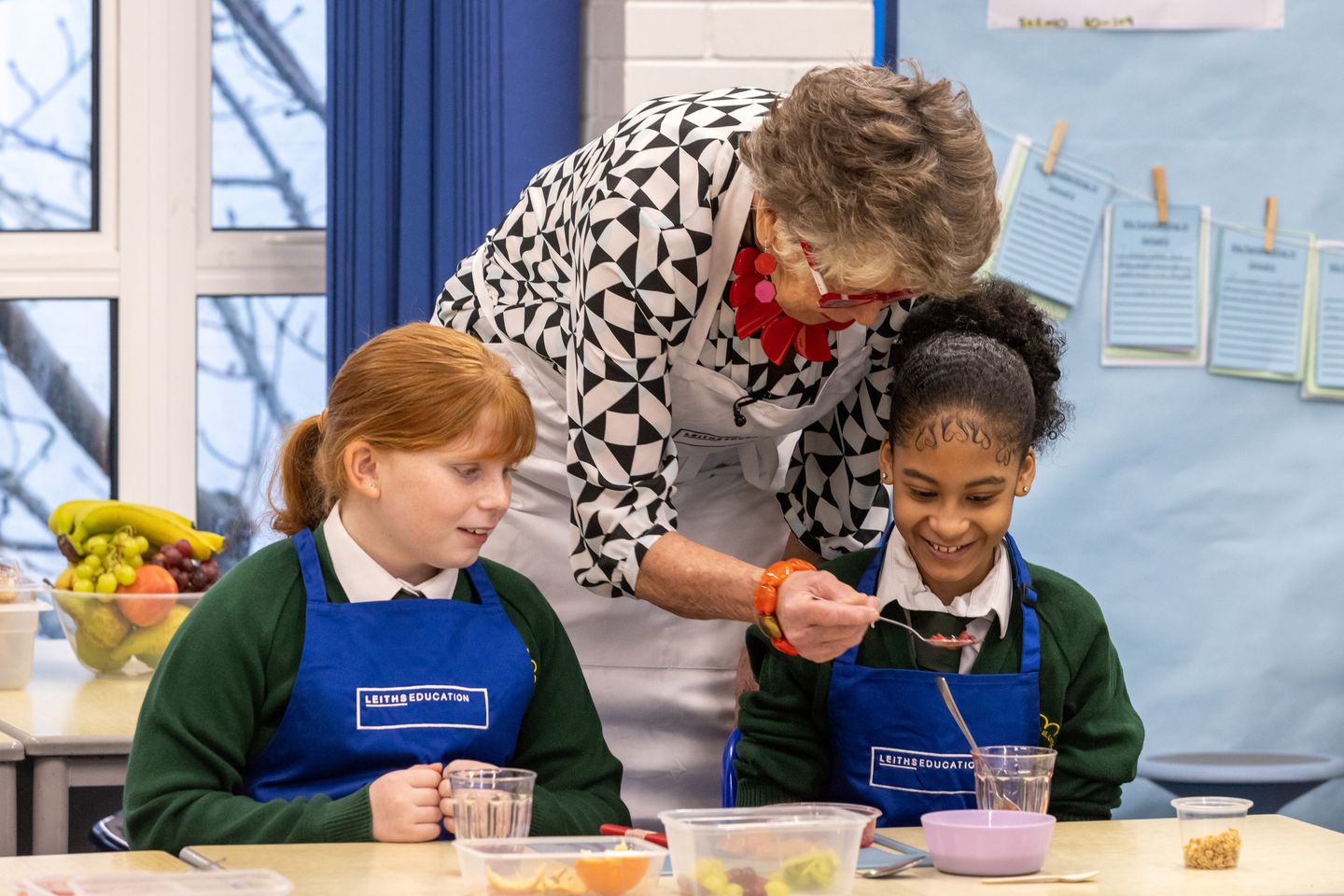 Prue Leith and school children
