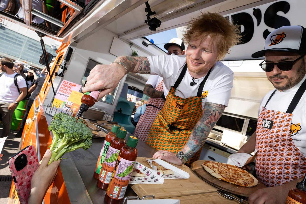 EDITORIAL USE ONLY Ed Sheeran surprises Sainsbury’s supermarket shoppers in London Colney to promote his Tingly Ted’s hot sau