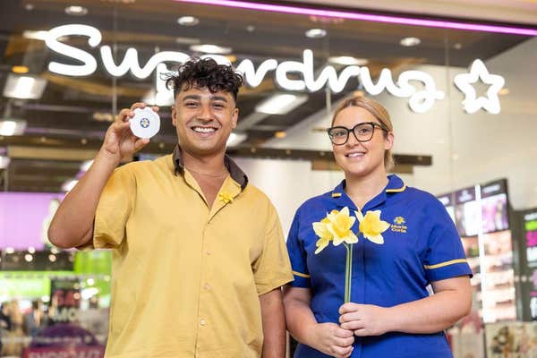 EDITORIAL USE ONLY Actor Karim Zeroual and Marie Curie Senior Nurse Sophie Graham at the launch of the Yellow Pennies fundrai