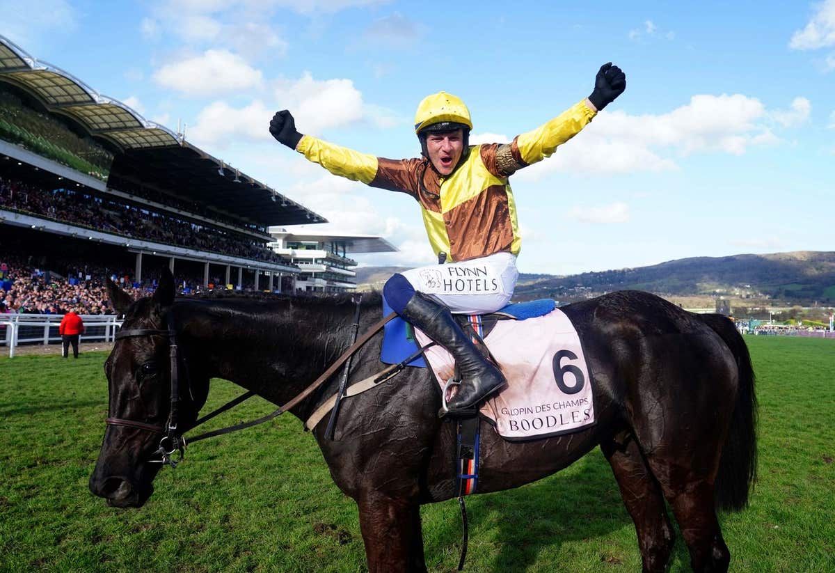 Jockey Paul Townend celebrates on Galopin Des Champs after winning the Boodles Cheltenham Gold Cup Chase on day four of the C