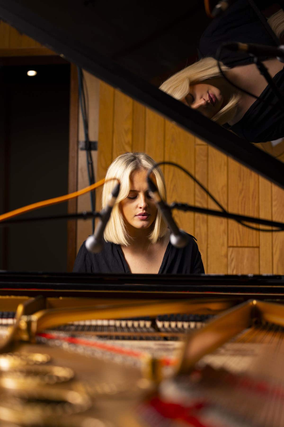 EDITORIAL USE ONLY Mel Raeburn records her version of ???Sonnet??? for the 2024 John Lewis Christmas advert at London???s Ang