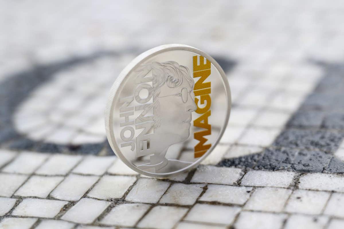 EMBARGOED TO 0001 FRIDAY MARCH 14 EDITORIAL USE ONLY A collectable coin featuring John Lennon and the word ‘Imagine’ is unvei