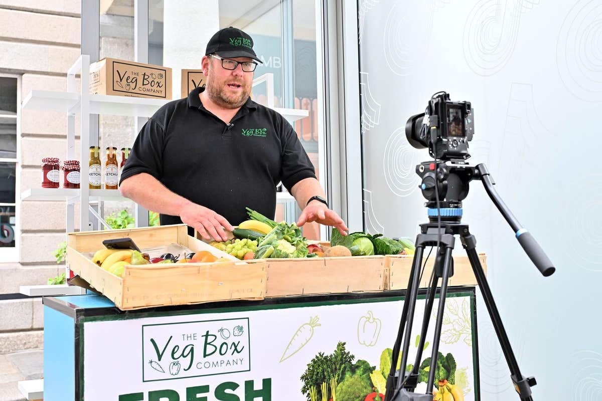 EDITORIAL USE ONLY Live stream seller Guy Baybutt from The Veg Box Company in a LIVE booth at the first TikTok Market hosted