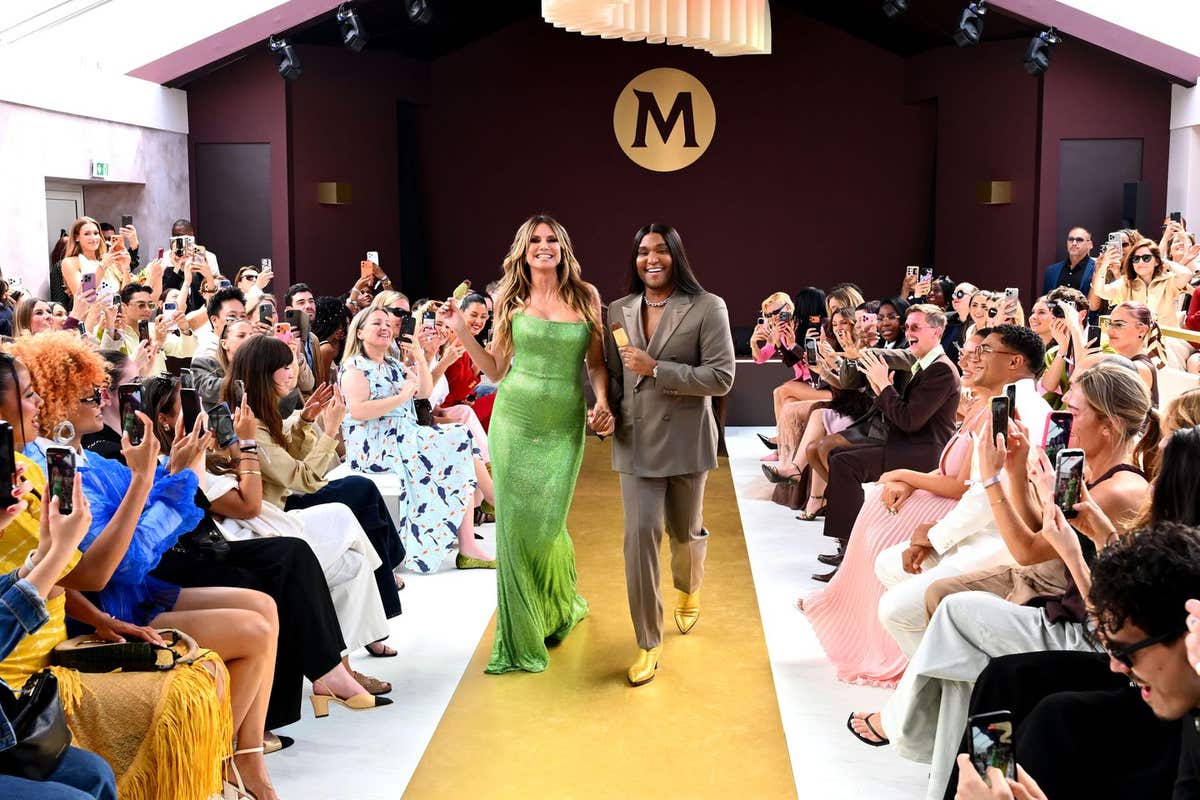 EDITORIAL USE ONLY Heidi Klum and Law Roach close the Magnum couture runway presentation at the House of Magnum during the Ca