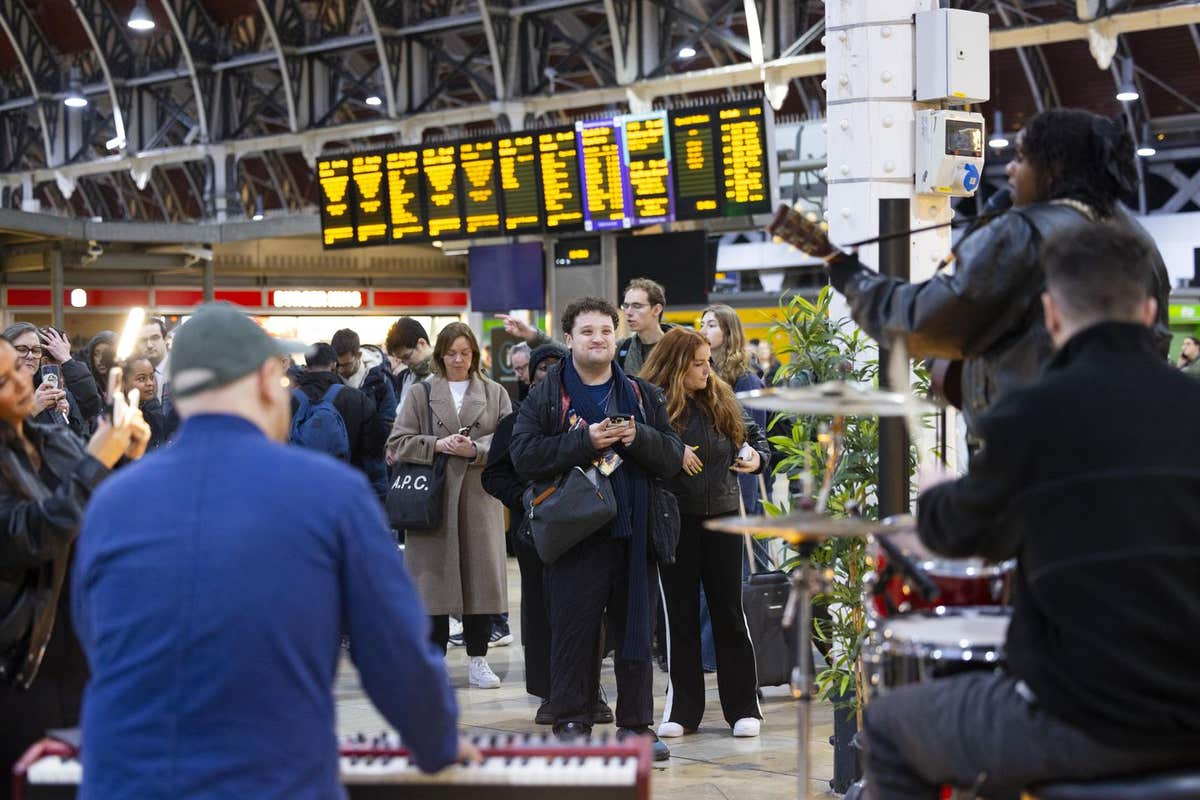 EDITORIAL USE ONLY Jazz and neo-soul inspired artist Ashaine White kicks off a series of surprise live gigs at train stations