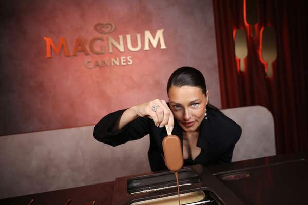 EDITORIAL USE ONLY Adriana Lima at the dipping bar at the Magnum VIP Party during the Cannes Film Festival in Cannes, France.