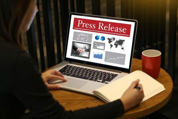JF0A2K Press Release concept, Thoughtful male person looking computer