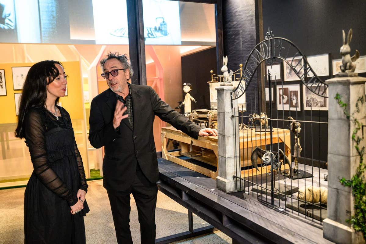 EDITORIAL USE ONLY Tim Burton and curator Maria McLintock visit ‘The World of Tim Burton’ , a new exhibition at the Design Mu