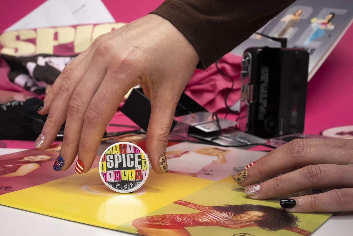 EMBARGOED TO 0001 TUESDAY MARCH 3 EDITORIAL USE ONLY A collectable £5 Spice Girls coin is unveiled by The Royal Mint to mark