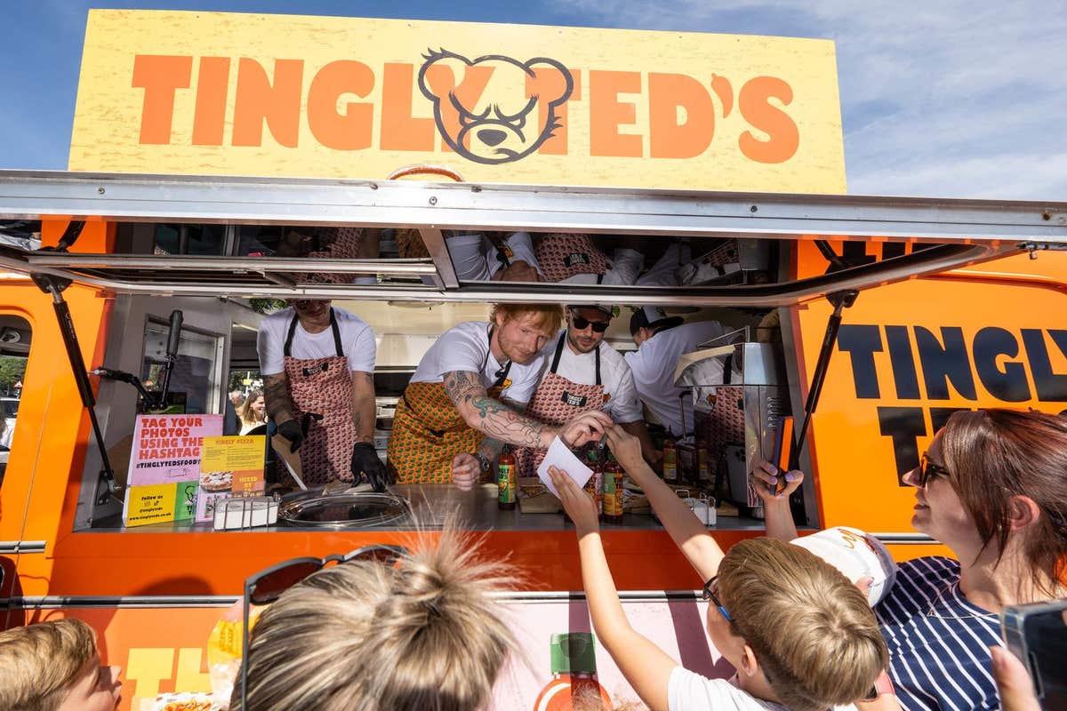 EDITORIAL USE ONLY Ed Sheeran surprises Sainsbury’s supermarket shoppers in London Colney to promote his Tingly Ted’s hot sau