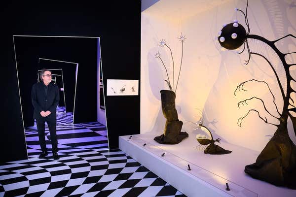 EDITORIAL USE ONLY Tim Burton visits ‘The World of Tim Burton’, a new exhibition at the Design Museum in London featuring ove