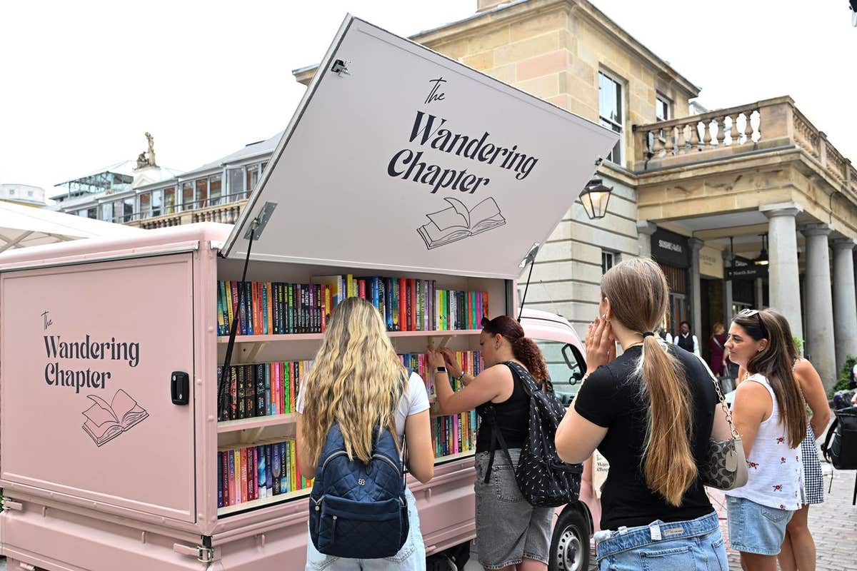 EDITORIAL USE ONLY Shoppers visit stalls at the first TikTok Market hosted at the Covent Garden Piazza in London, with LIVE s