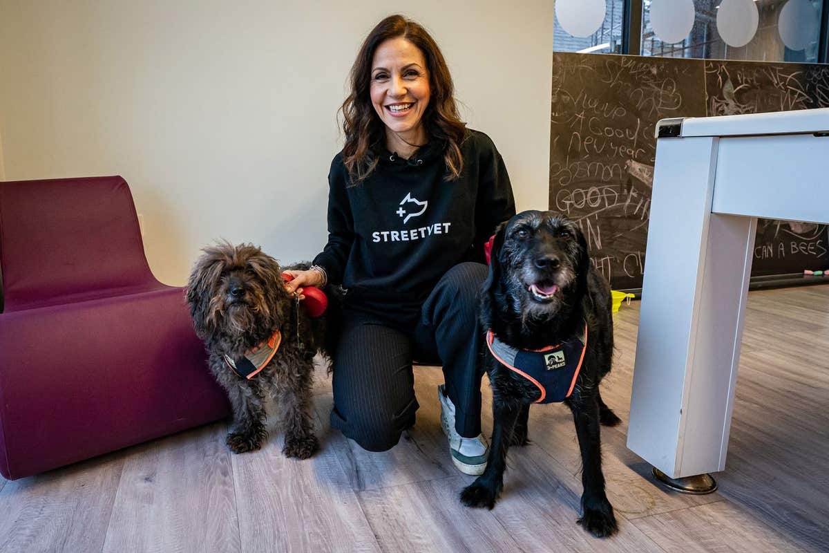 EDITORIAL USE ONLY Julia Bradbury with Macey, left, and Max, right, as they attend a collaborative event hosted by MSD Animal