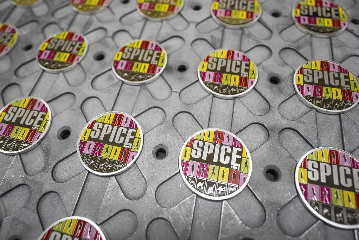 EDITORIAL USE ONLY A collectable £5 Spice Girls coin is unveiled by The Royal Mint to mark 30 years since the debut of the ba