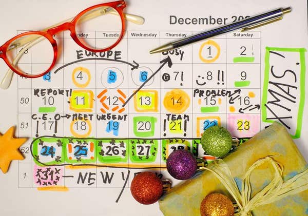 2T7AKE4 Calendar with business appointments, entries of christmas holidays, christmas balls and christmas gift.