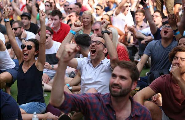 Belgium football fans celebrate their team’s second goal as they watch the FIFA World Cup third place play-off match between 