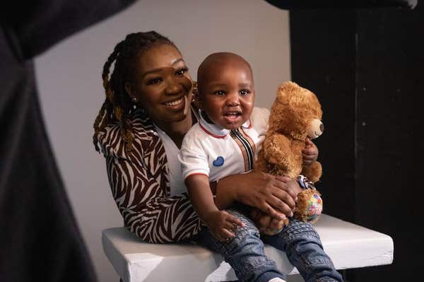 EMBARGOED TO 0001 WEDNESDAY MAY 31 EDITORIAL USE ONLY Thenjiwe Imbayago, 32, from Northampton, and her one-year-old son Gordo