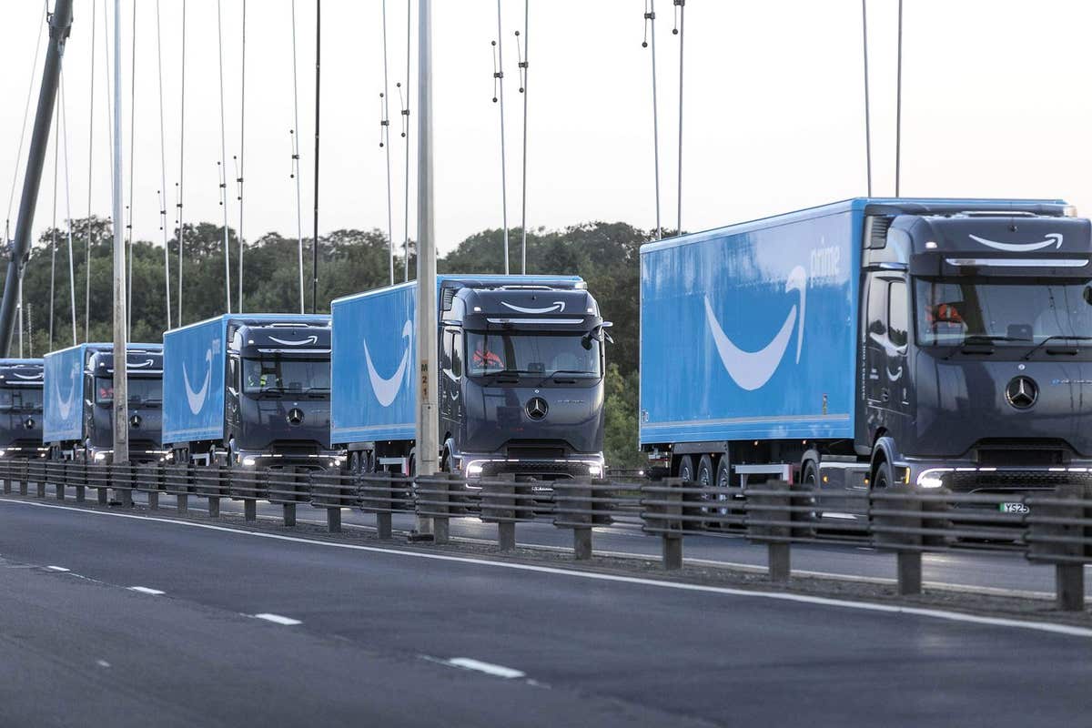 EDITORIAL USE ONLY A convoy of electric heavy-goods vehicles (eHGVs) arrive in the UK, across the Humber Bridge in Yorkshire,
