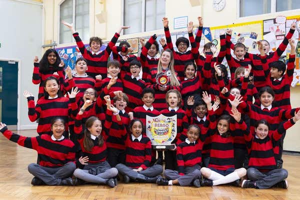 EDITORIAL USE ONLY Students from Year 6 at Northside Primary School in North Finchley, London, celebrate as their class has b