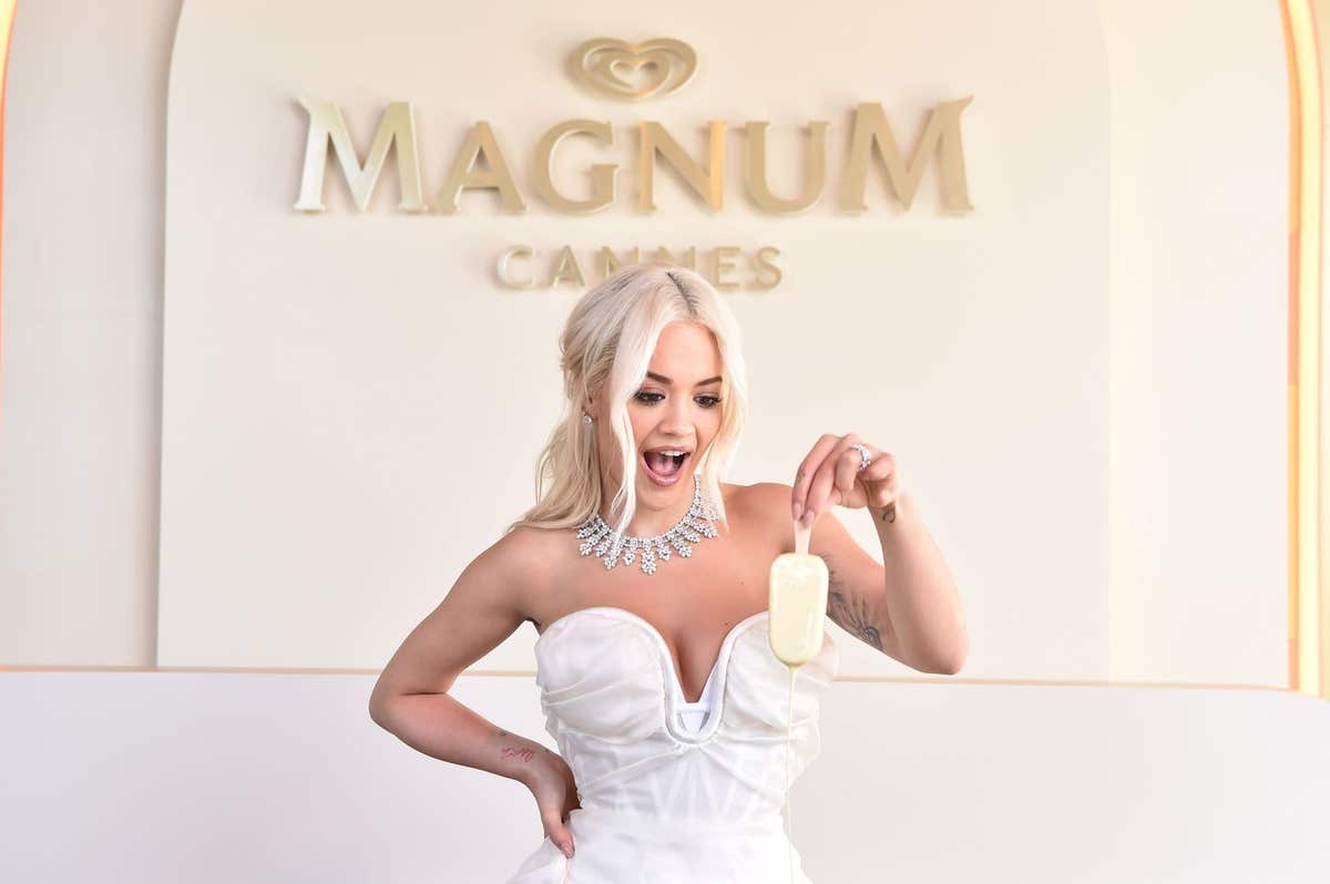 EDITORIAL USE ONLY Rita Ora makes her very own personalised Magnum at the Magnum ‘True to Pleasure’ event in Cannes.