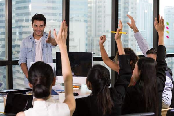 W33H77 Business people raising there hand up at a conference meeting to answer a question, Opportunity to comment concept