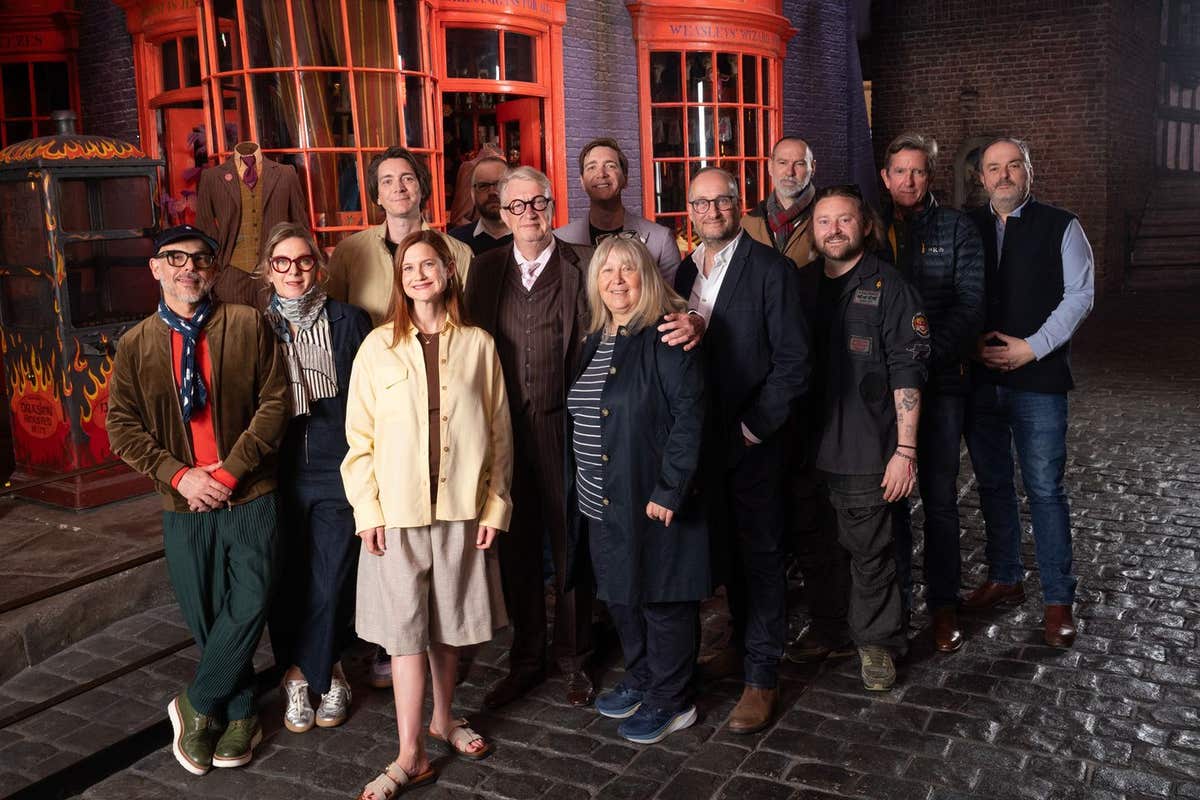 EDITORIAL USE ONLY Mark Williams, James and Oliver Phelps, Bonnie Wright with a number of behind the scenes filmmakers visit
