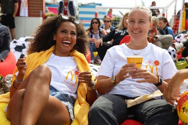 EDITORIAL USE ONLY Former-Love Islander Amber Gill andLioness and McDonald’s football ambassador Beth Mead (right) attend a s