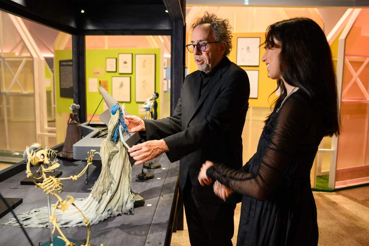 EDITORIAL USE ONLY Tim Burton and curator Maria McLintock visit ‘The World of Tim Burton’ , a new exhibition at the Design Mu