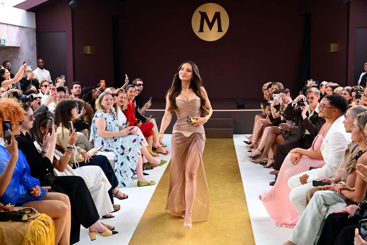 EDITORIAL USE ONLY A model walks during the Magnum couture runway presentation at the House of Magnum during the Cannes Film
