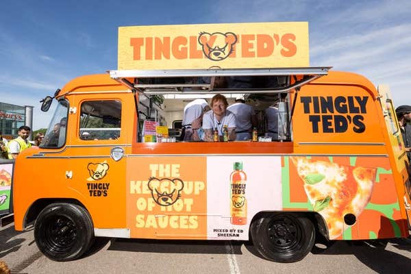 EDITORIAL USE ONLY Ed Sheeran surprises Sainsbury’s supermarket shoppers in London Colney to promote his Tingly Ted’s hot sau