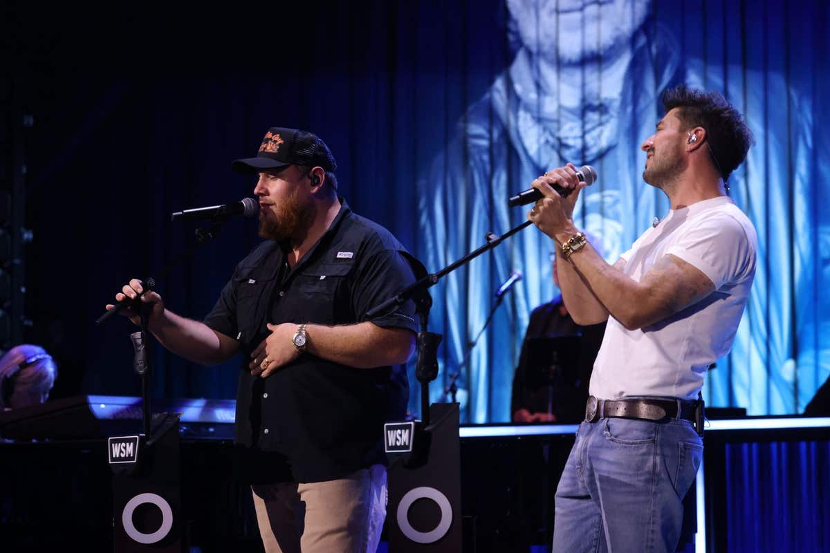 EDITORIAL USE ONLY Luke Combs and Marcus Mumford perform during Grand Ole Opry: Live in London, at the Royal Albert Hall, whe
