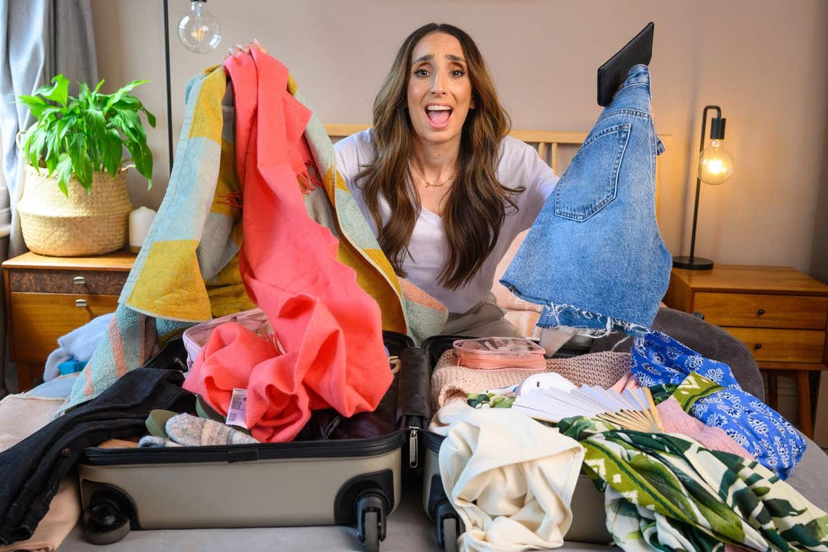 EMBARGOED TO 0001 WEDNESDAY JUNE 19 EDITORIAL USE ONLY Organisation expert Jemma Solomon demonstrates packing for an upcoming